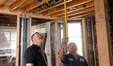 Licensed plumber completing repair work